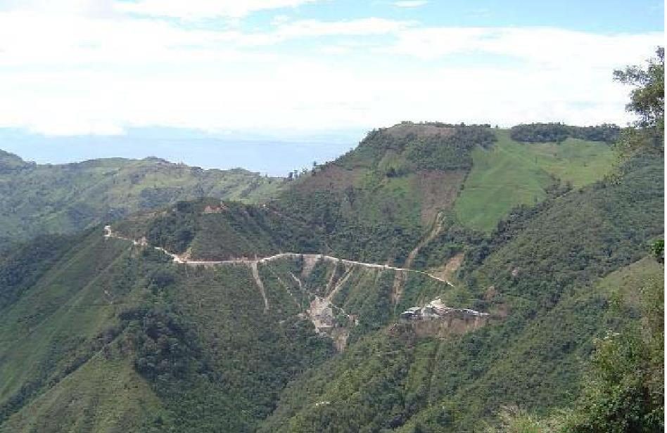 Company access road climbing to the mine